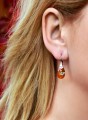 Pomarańczowe  wiszące kolczyki krople, kryształ Swarovski® kropla, srebro 925 na modelce