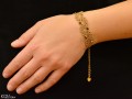 złota bransoletka frywolitka listki z krysztalami swarovski zlote brazowe reka.JPG